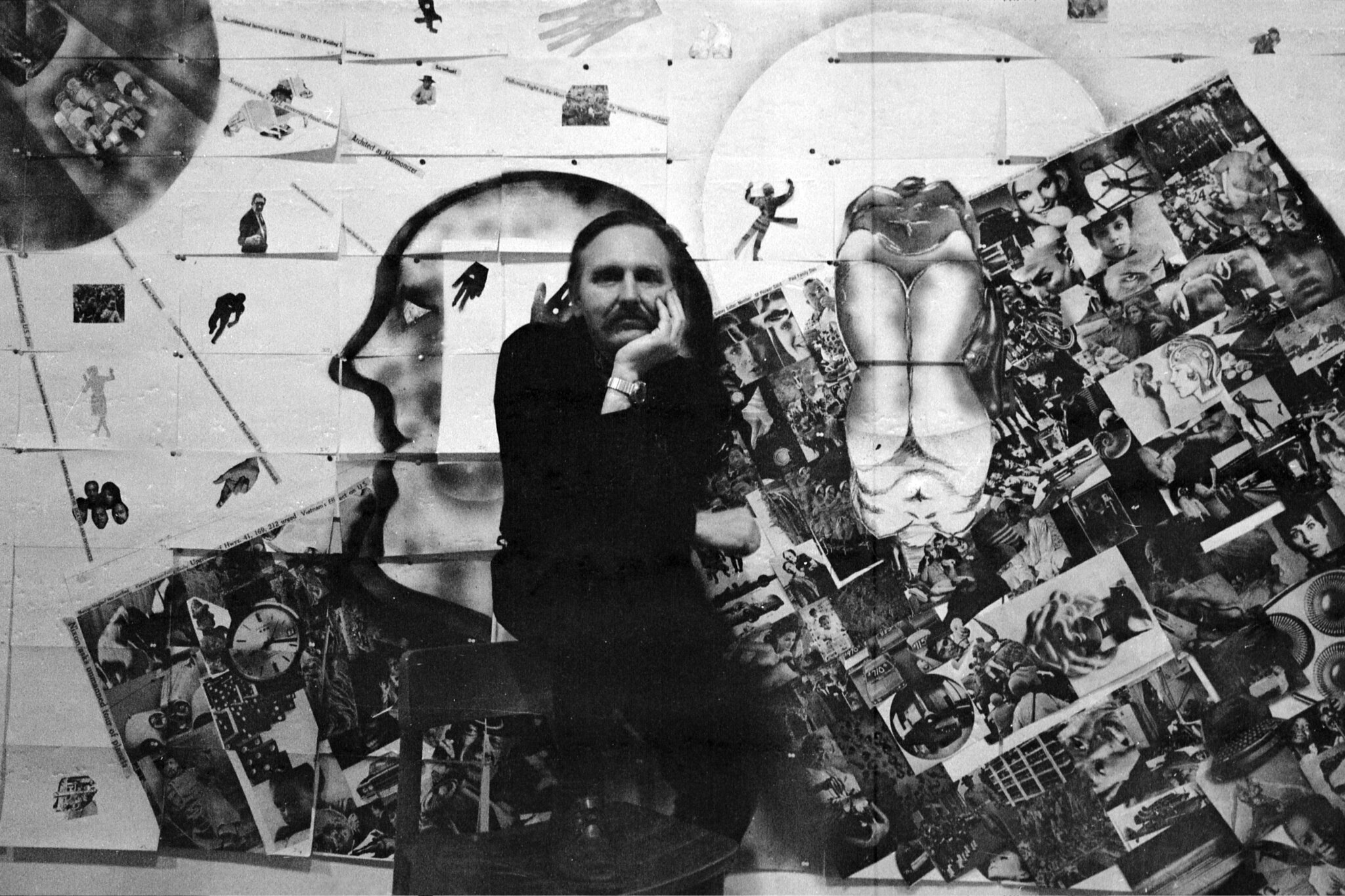 Stan VanDerBeek in front of Panels for the Walls of the World: Phase II, 1970, …